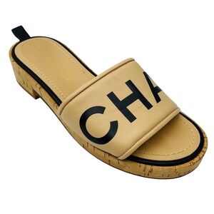 CHANEL TAN / BLACK LOGO LEATHER AND CORK SLIDE SANDALS